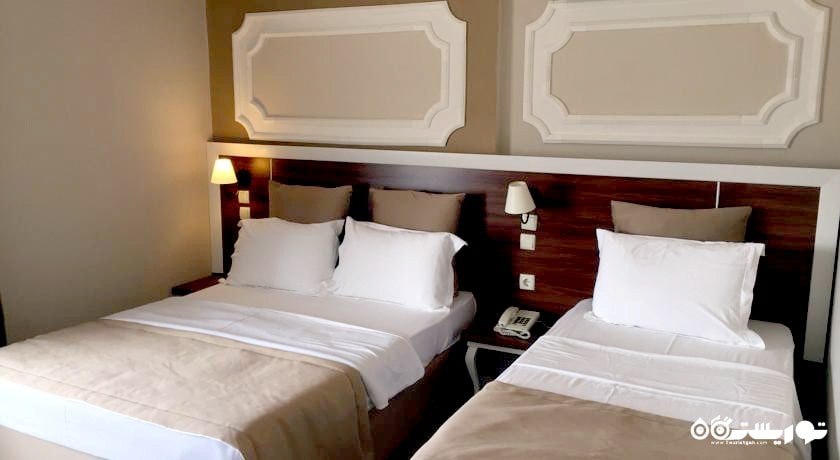 نمای تخت های اتاق تریپل